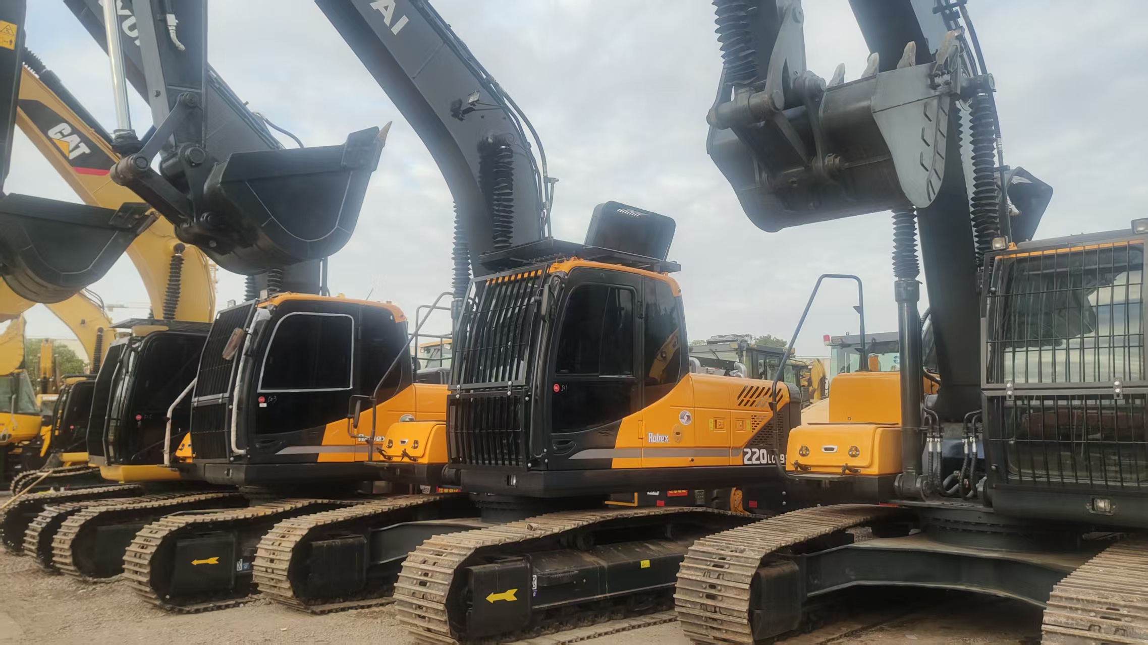 Multiple excavators in the Shanghai equipment yard